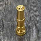 Brass Adjustable Water Nozzle by Dramm standing on end