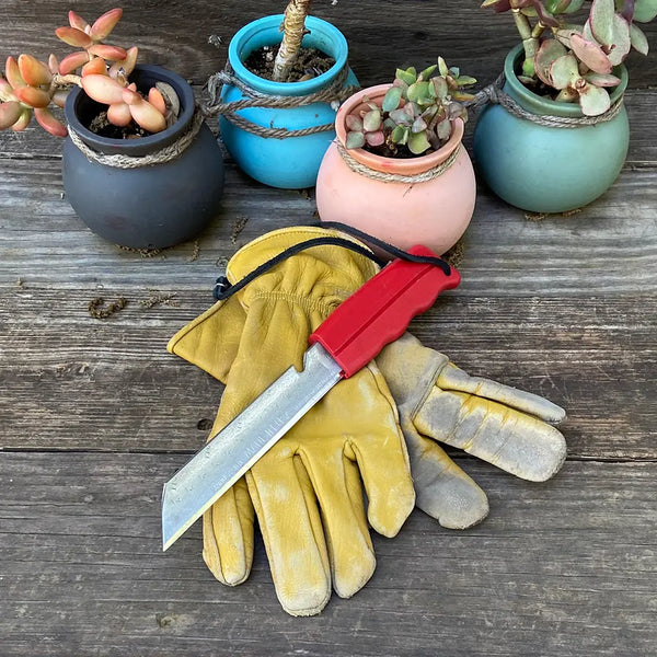 Discovery Garden Knife by Wilcox on garden table