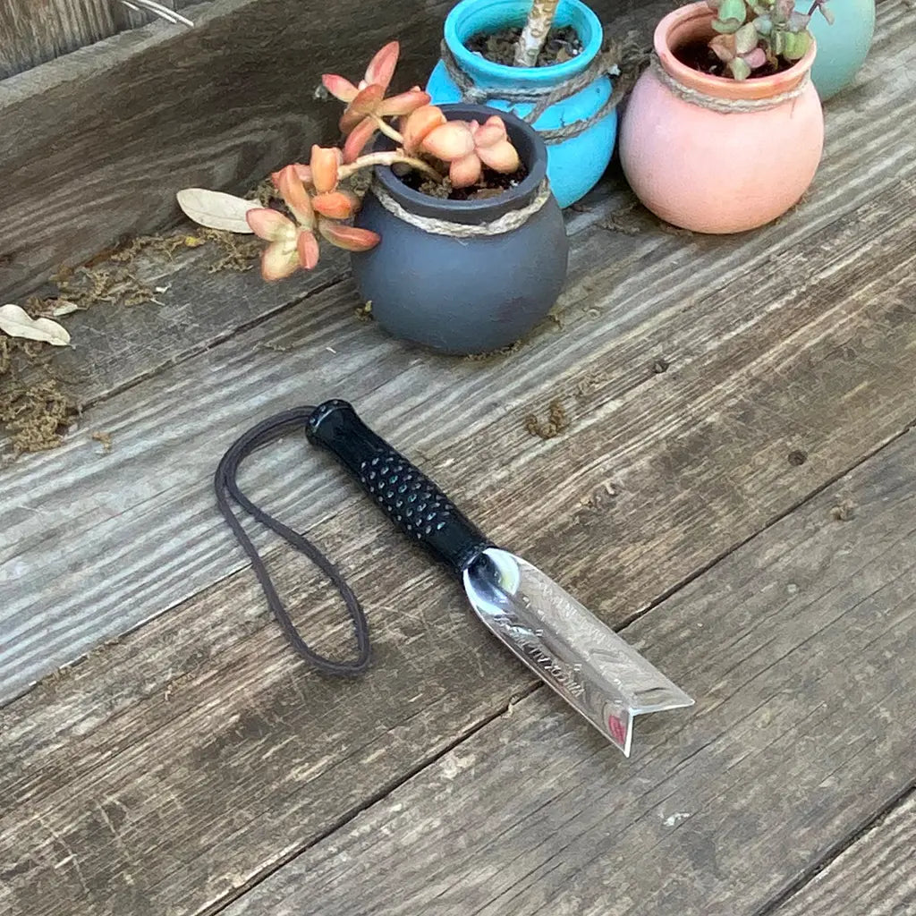 Small Eco Weeder by Wilcox on garden table